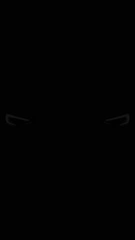 Close up of details of switched on led lights of anonymous prestigious luxury modern car. Car flashing light with blinking indicator. Car Blinker Light, Vertical video