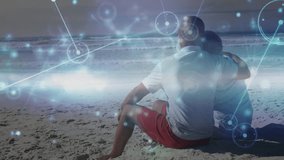 Mature man wrapping arm around senior woman gazing at animated finance chart over sandy beach. Romantic, tranquility, coastal, sunset, companionship, serenity, natural - Powered by Shutterstock - Get 15% off with code: PIKWIZARD15