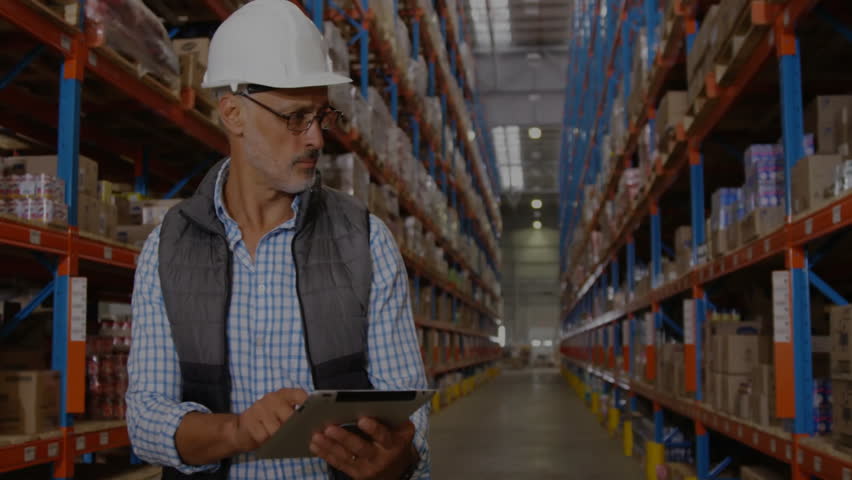 Man inspecting warehouse aisle, using tablet, displaying digital map graphic over racks. Logistics, industrial, technology, inventory, safety, organization, scanning - Powered by Shutterstock - Get 15% off with code: PIKWIZARD15