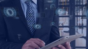 Male business executive tapping tablet at office, projecting holographic tech data icons and charts. Futuristic, technology, innovation, digital, corporate, sleek, modern - Powered by Shutterstock - Get 15% off with code: PIKWIZARD15