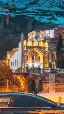 Tbilisi, Georgia. Scenic View Of Abanotubani - Bath District. hyperlapse Urban street timelapse walklapse. Ancient District Of Tbilisi, Georgia, Sulfuric Baths. Night Evening Scenic View Of old