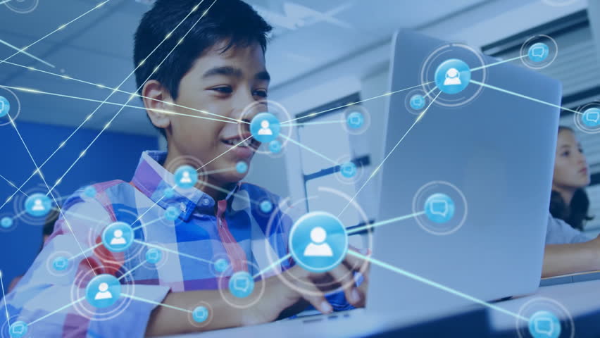 Teenage boy typing on laptop in computer lab, showing education technology network data overlay. Technology, education, digital, innovation, collaboration, learning, futuristic - Powered by Shutterstock - Get 15% off with code: PIKWIZARD15