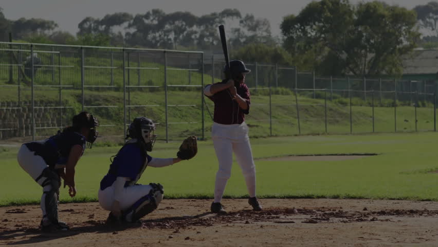 female batter standing at home plate with catcher crouching, displaying sports analytics overlay. Athletic, competition, technology, outdoor, determination, teamwork, dynamic - Powered by Shutterstock - Get 15% off with code: PIKWIZARD15