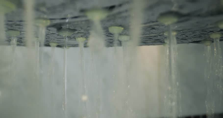 Shower water flowing, macro wide angle shot with probe lens
