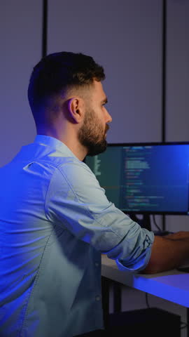 Cybersecurity analyst working on code and system monitoring