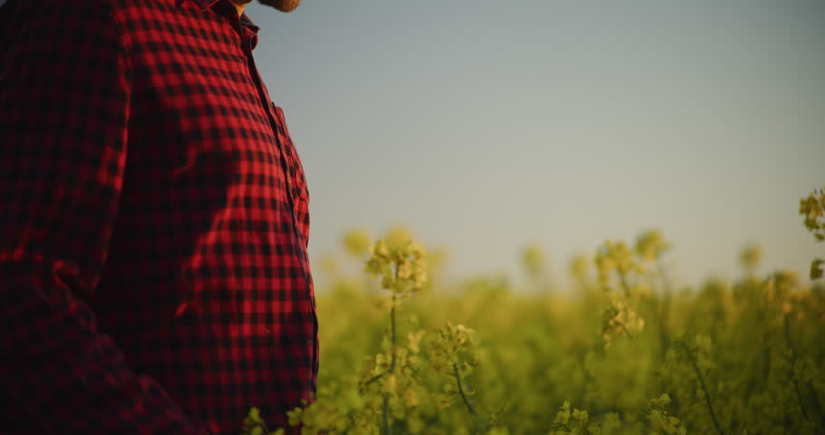 Close-up shot of a distressed farmer showing emotions such as sadness and depression, highlighting rural struggles.