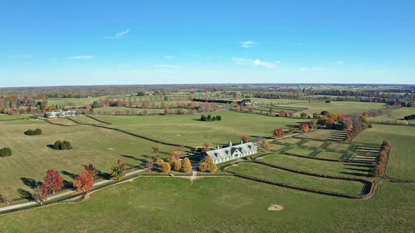 Aerial view of stables and fences of a horse farm in Central Kentucky