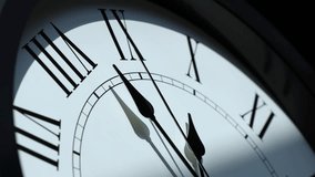Sun and sky reflecting in the watch during the time passing by. Time lapse on a modern white Clock on white.  Close up to a wall clock, with running time pointer. Wall clock show the running time.  - Powered by Shutterstock - Get 15% off with code: PIKWIZARD15