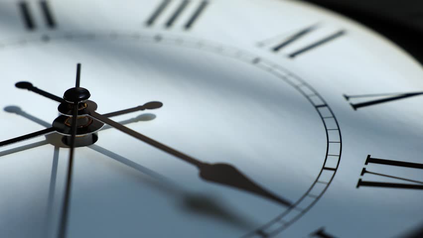 Sun and sky reflecting in the watch during the time passing by. Time lapse on a modern white Clock on white.  Close up to a wall clock, with running time pointer. Wall clock show the running time.  - Powered by Shutterstock - Get 15% off with code: PIKWIZARD15