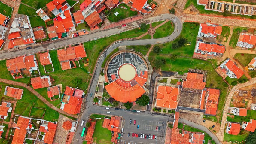 Aerial orbit establishing in the bullring of La Maestranza in the town of Guatavita, with orange tile roofs in a small tourist town in Cundinamarca, Colombia.