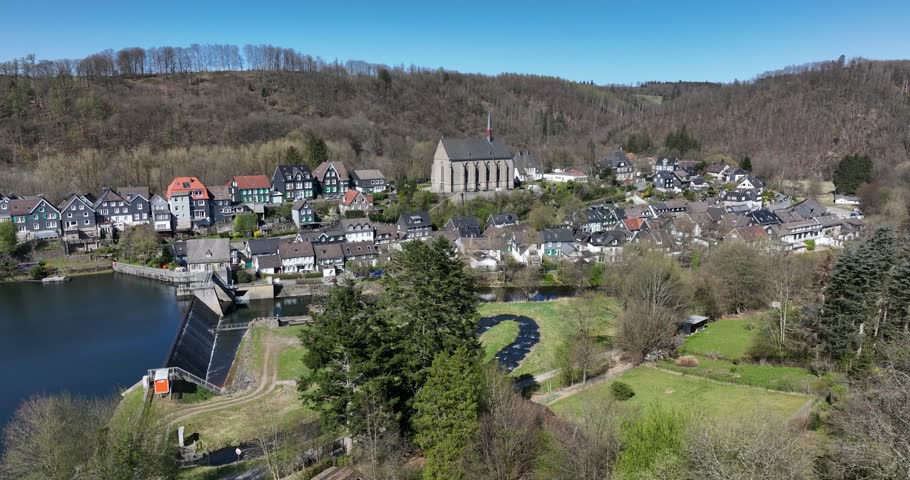 The Wupper forms a reservoir, picturesquely located at the foot of the old town of Beyenburg, Beyenburger Stausee. Aerial view.