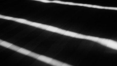 Shadows of Blinds on Bed