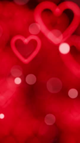 Red Heart Bokeh Loop Animation. Valentine's day. Vertical looped animation.
