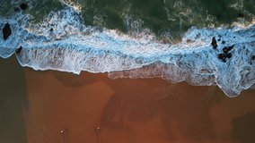 Stunning Aerial Coastal View Showcasing Waves Crashing Gracefully on Golden Beach Sand - Powered by Shutterstock - Get 15% off with code: PIKWIZARD15