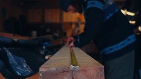 A Man Marks Measurements on a Wooden Board in Preparation For a Pajero Makeover - Close Up - Powered by Shutterstock - Get 15% off with code: PIKWIZARD15