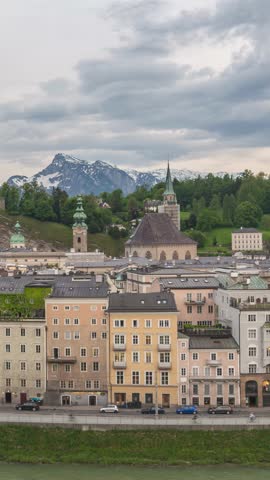 Salzburg Austria time lapse day to night city skyline at Fortress Hohensalzburg (Vertical)