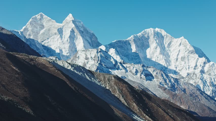 Breathtaking landscapes of the Everest region with snow-capped peaks, glacial rivers, and serene valleys along the iconic Base Camp trekking route in Nepal