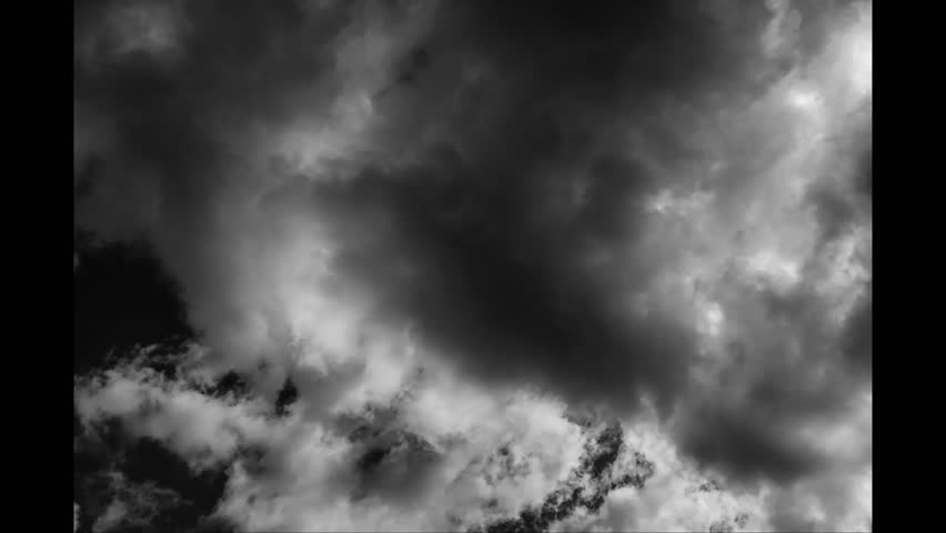 Stormy Dark Sky With Massive Clouds Running Quickly Across The Sky. Timelapse With Black Clouds. Dramatic Cloudscape. Scary Stormy Sky With Hudge Clouds.
