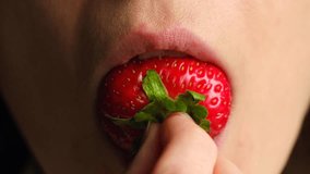 Close up woman savoring ripe strawberry, shown from holding berry to closing her mouth after delightful bite. Female eating fresh strawberry. Girl mouth eat fresh strawberry, juicy vitamin rich berry - Powered by Shutterstock - Get 15% off with code: PIKWIZARD15