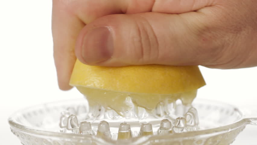 Squeezing fresh lemon