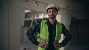 Portrait confident Caucasian man put hands to hips sides akimbo power strong pose male in hardhat guy worker contractor industry engineer in helmet vest builder architect building construction foreman - Powered by Shutterstock - Get 15% off with code: PIKWIZARD15
