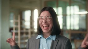 Happy Asian businesswoman emotional excited business woman joyful Chinese Korean girl worker employee manager Japanese smiling architect female rejoice win dancing achievement jump celebrate in office - Powered by Shutterstock - Get 15% off with code: PIKWIZARD15