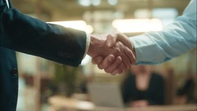 Business men hands handshake close up shaking arms close up guys unrecognizable businessmen welcome greeting in office male partnership handshaking agreement cooperation deal hire candidate recruit - Powered by Shutterstock - Get 15% off with code: PIKWIZARD15