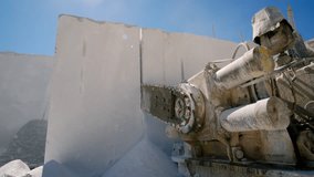 Marble quarry mining, industrial saw cutting rock into large pieces for further processing - Powered by Shutterstock - Get 15% off with code: PIKWIZARD15