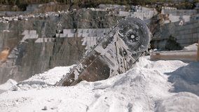 Marble quarry mining, industrial saw cutting rock into large pieces for further processing - Powered by Shutterstock - Get 15% off with code: PIKWIZARD15