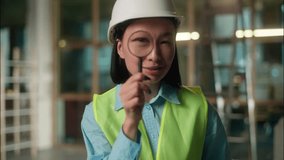 Asian woman engineer inspector look through magnifier vision Chinese Korean Japanese girl architect builder looking magnifying glass big zoomed eye search analyze building construction investigation - Powered by Shutterstock - Get 15% off with code: PIKWIZARD15