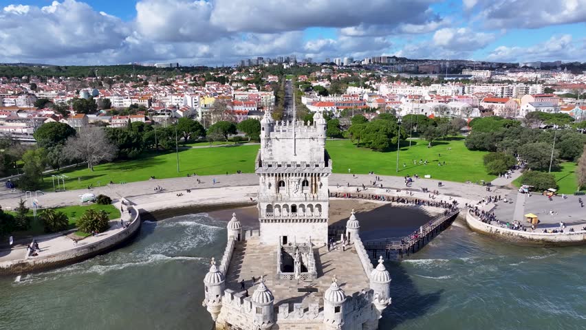 Belem Tower At Lisbon In District Of Lisbon Portugal. Iconic Castle. Tourism Landmark. Belem Tower At Lisbon In Portugal. Medieval Fortress. Tejo River Landscape. Lisbon Skyline.