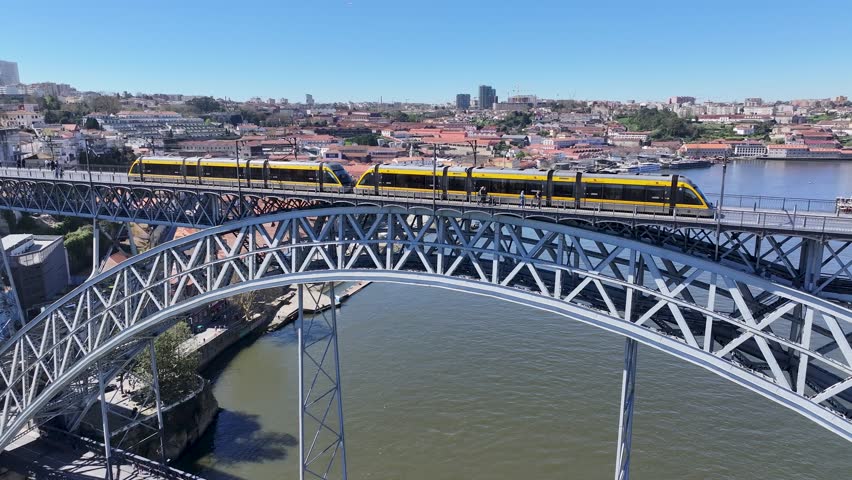 Luis I Bridge At Porto In Porto District Portugal. Downtown Cityscape. Railroad Station. Iron Bridge Scenery. Luis I Bridge At Porto In Portugal. Tourism Landmark.