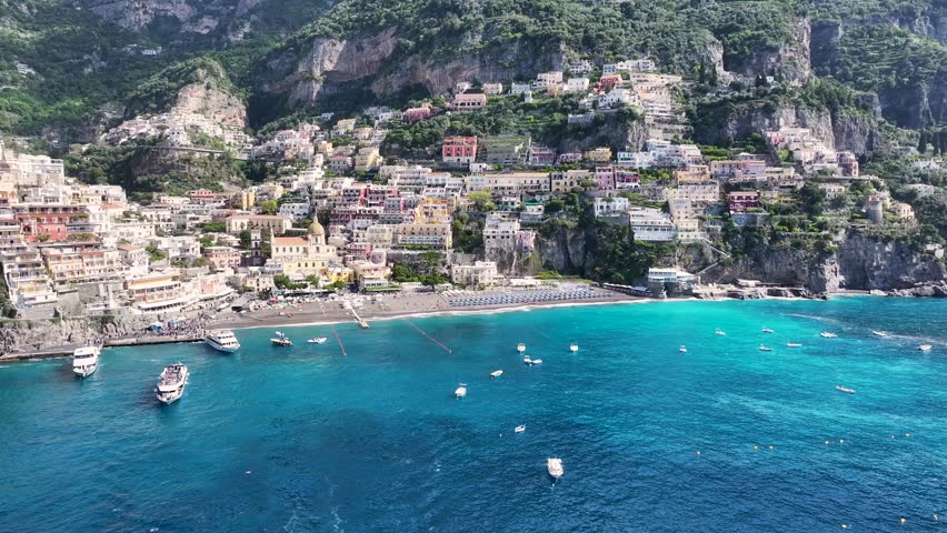 Amalfi Coast At Positano In Salerno Italy. Coastal City. Waterfront Landscape. Amalfi Coast At Positano In Salerno Italy. Beach Scenery. Medieval Buildings. Amalfi Coast Skyline.