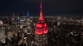 Night View Of Empire State Building At Manhattan In New York United States. City At Night Landscape. Illuminated Downtown. Empire State Building At New York United States. Emblematic Building. - Powered by Shutterstock - Get 15% off with code: PIKWIZARD15