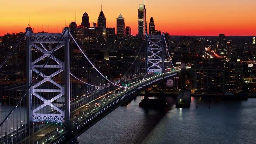 Sunset Skyline In Benjamin Franklin Bridge At Philadelphia In Pennsylvania United States. Highrise Buildings Landscape. Colorful Sunset. Philadelphia At Pennsylvania United States.