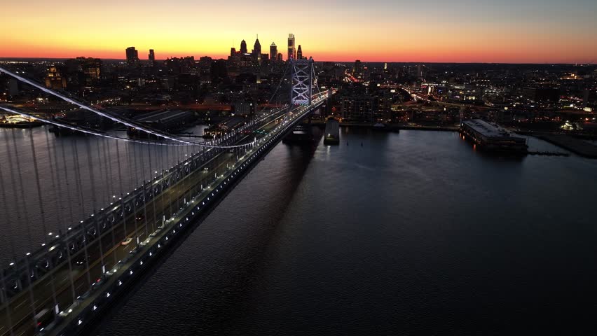 Sunset Skyline In Ben Franklin Bridge At Philadelphia In Pennsylvania United States. Highrise Buildings Landscape. Colorful Sunset. Philadelphia At Pennsylvania United States.