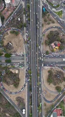Vertical drone shots over a cloverleaf interchange in south of CDMX