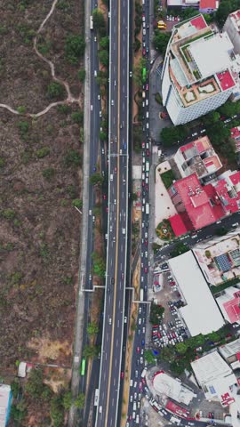 Vertical drone shots over a cloverleaf interchange in south of CDMX