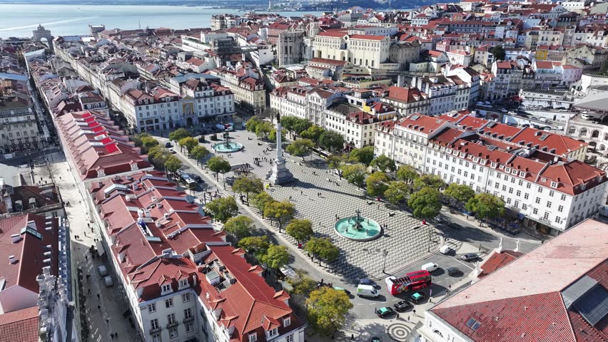 Dom Pedro Iv Square At Lisbon In District Of Lisbon Portugal. Highrise Buildings Scenery. Beautiful Cityscape. Dom Pedro Iv Square At Lisbon In Portugal. Historic City Landscape. Tourism Landmark.