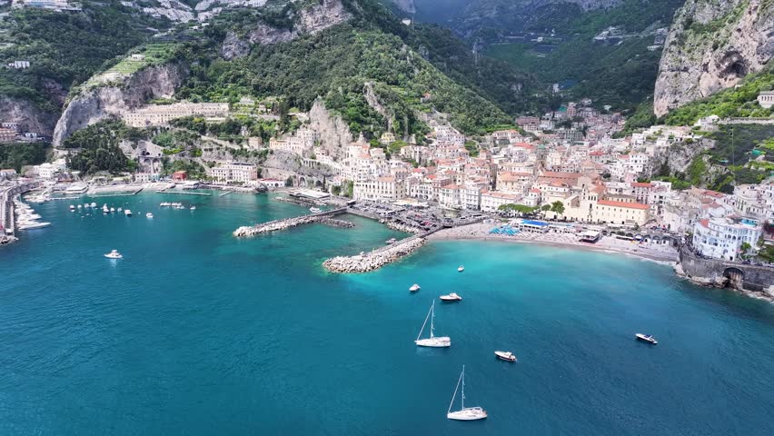 Amalfi Coast At Amalfi In Salerno Italy. Beach Landscape. Giant Cliffs Scene. Amalfi Coast At Salerno Italy. Medieval City Skyline. Gulf Of Salerno Mediterranean Sea. Mediterranean Sea. Amalfi Coast.