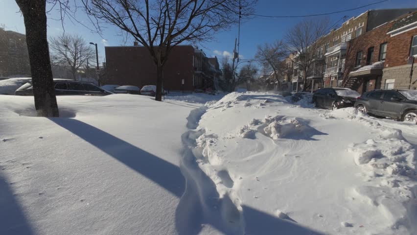 After snowstorm, street-level view of Vieux Rosemont, Montreal