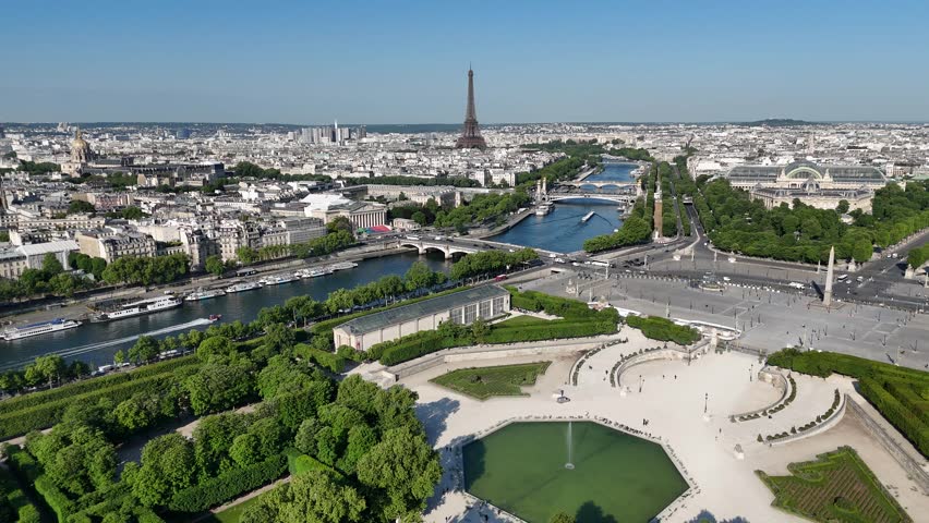 Tuileries Gardens At Paris Ile De France In France. Tuileries Carousel. Paris Skyline Scene. Tuileries Gardens At Paris In Ile De France France. Beautiful Eiffel Tower. Tourism Landmark.