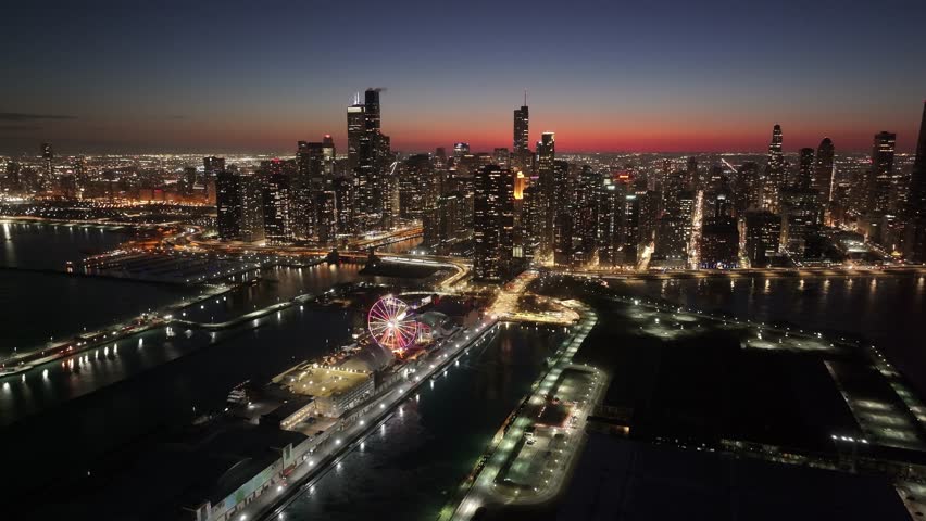 Sunset Chicago Skyline At Chicago In Illinois United States. Illuminated Downtown. Sunset City Landscape. Chicago At Illinois United States. Chicago City District. City Skyline Scene.