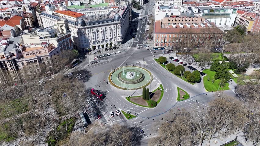 Neptuno Fountain At Madrid Spain. Famous Roundabout. Downtown Cityscape. Cultural Heritage Skyline. Neptuno Fountain In Spain. Madrid Street Scene.