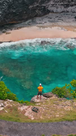 Bali famous landmark and popular travel destination, Broken Beach (Pantai Pasih Uug) with scenery stone bridge and nature pool Bali, Indonesia 4K