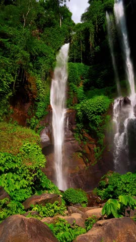 Bali waterfall Sekumpul the highest and most beautiful waterfall Bali Famous landmark and popular travel destination Indonesia 4K