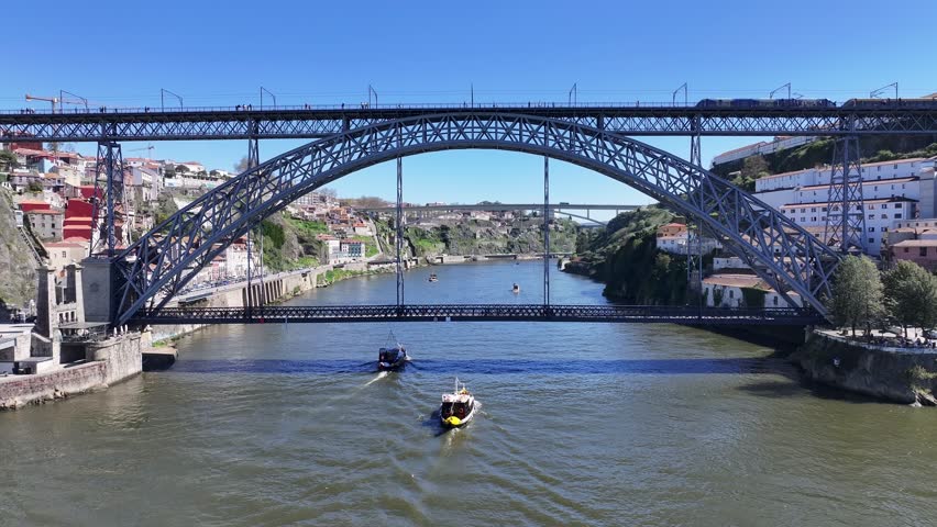 Luis I Bridge At Porto In Porto District Portugal. Downtown Cityscape. Railway Bridge. Railroad Scenery. Luis I Bridge At Porto In Portugal. Tourism Landmark.