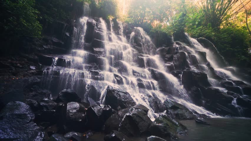 Bali Waterfall Kanto Lampo one of the most beautiful tropical waterfalls Bali famous landmark and popular travel destination Bali, Indonesia 4K
