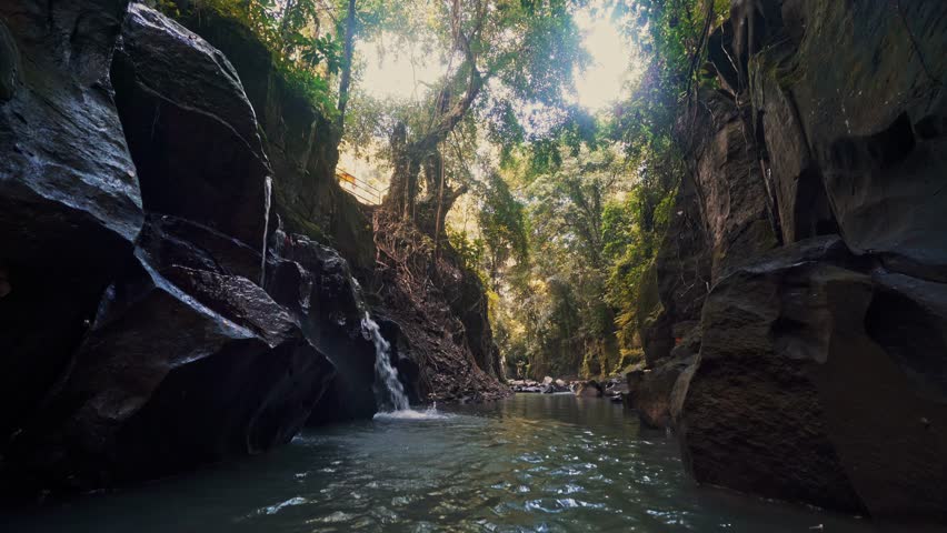 Bali Waterfall Kanto Lampo one of the most beautiful tropical waterfalls Bali famous landmark and popular travel destination Bali, Indonesia 4K