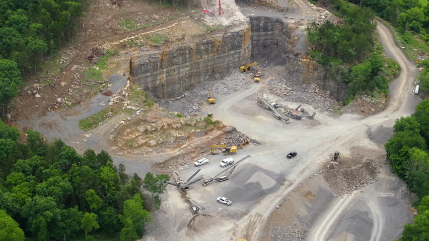 Large quarry with processing plant for crushed stone. Extracting of natural resources for construction industry